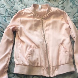 A nice pink bomber jacket.
